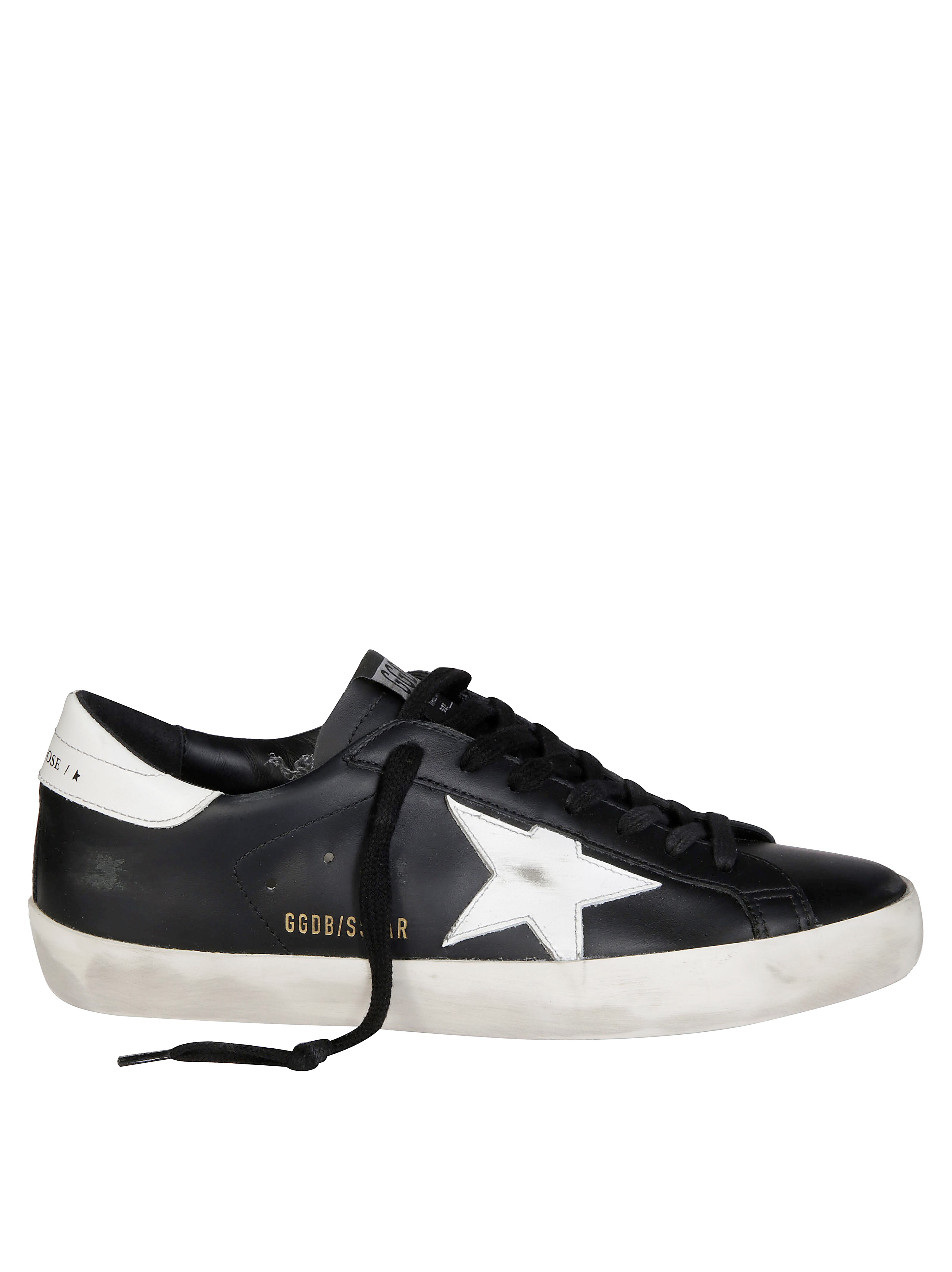 Golden Goose 'super-star' Black Low Top Sneakers With Logo Patch And Suede Details In Leather Man In Nero