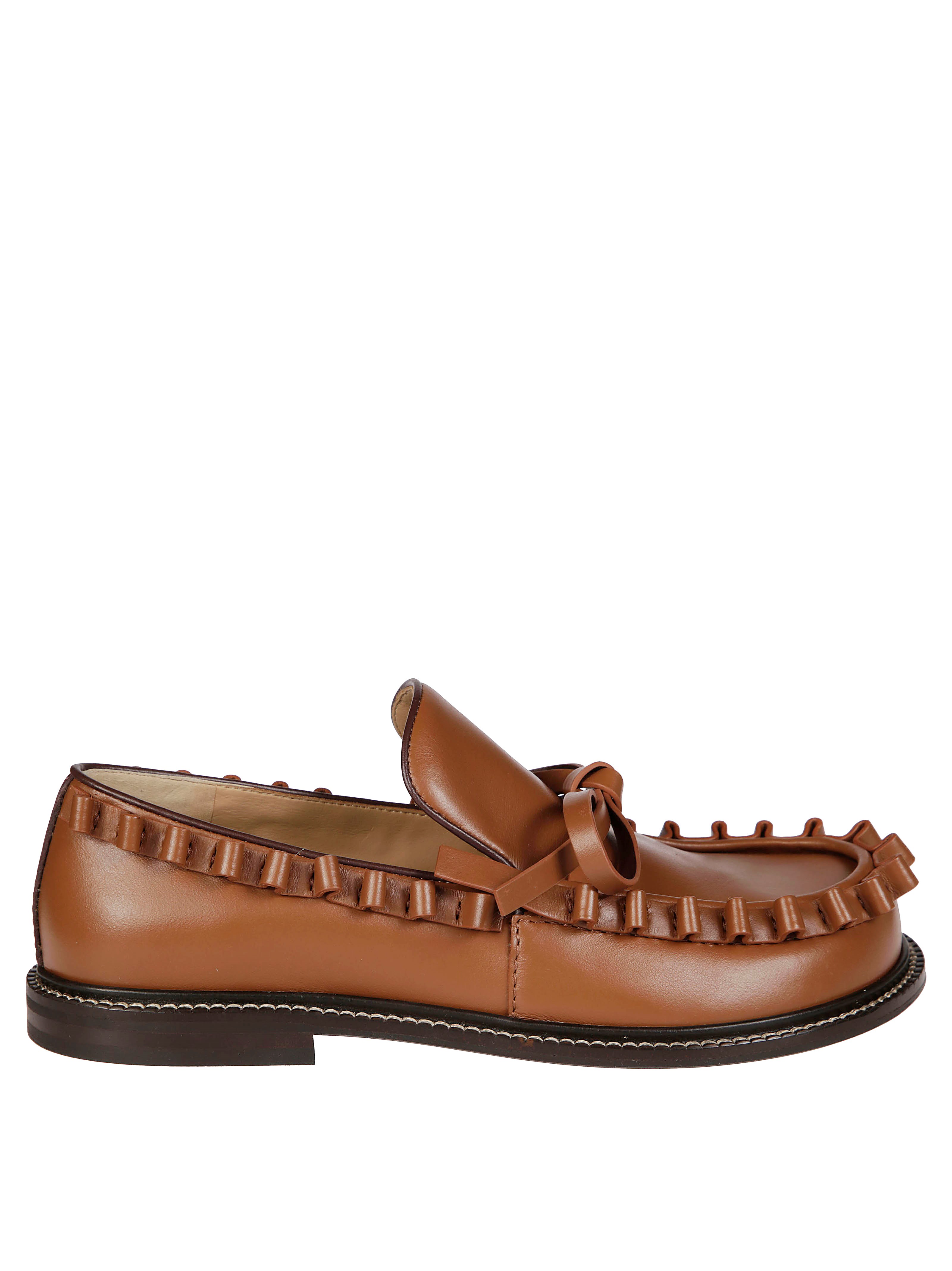 Jw Anderson Fringe Detail Bow Accent Loafers In Brown