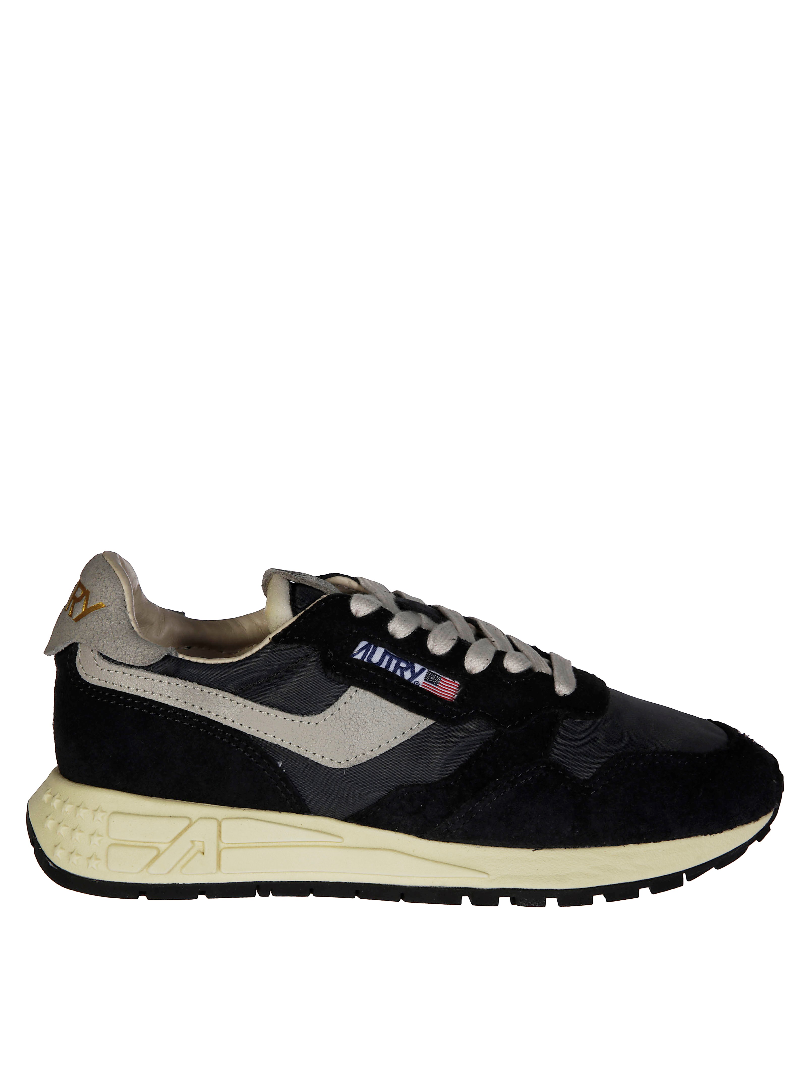 Autry Low Top Sneakers Featuring Silver Accents In Blue